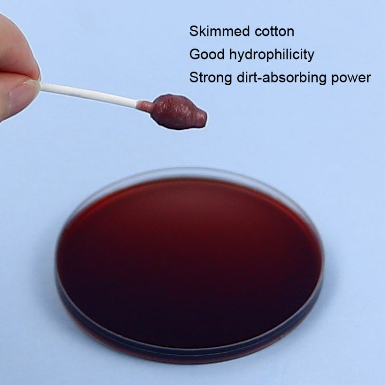 Pet cotton swab cotton tip shown dipped in dark liquid for cleaning