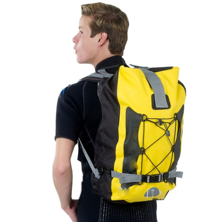 Waterproof diving fin backpack bag worn on model, blue and black with padded shoulder straps