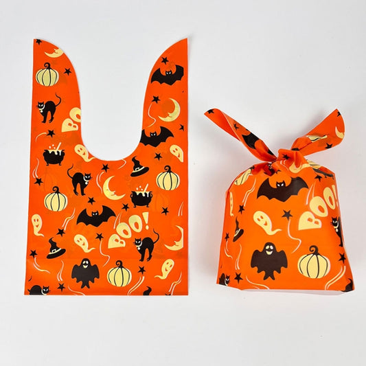 Halloween treat gift bags, orange pattern with pumpkins and bats, one with matching tied pouch