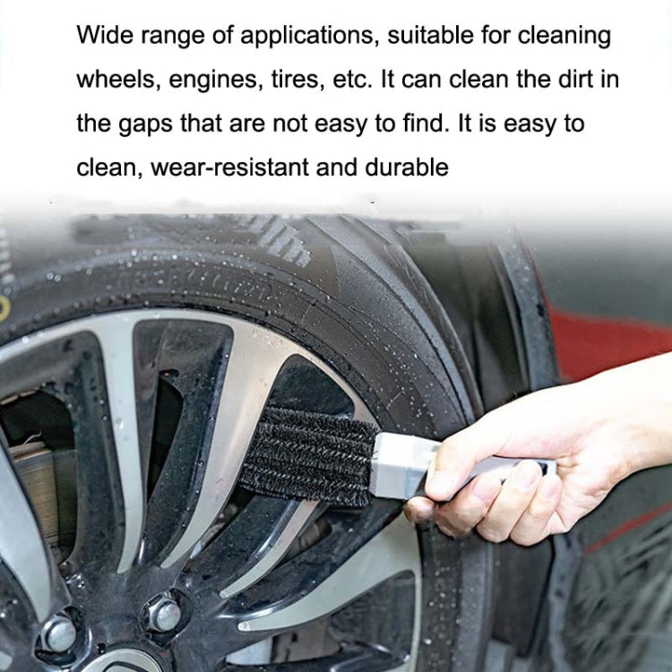Car wheel hub cleaning brush with black bristles used on wheel spokes