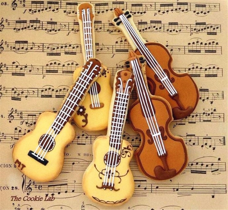 Guitar and violin illustration over sheet music background