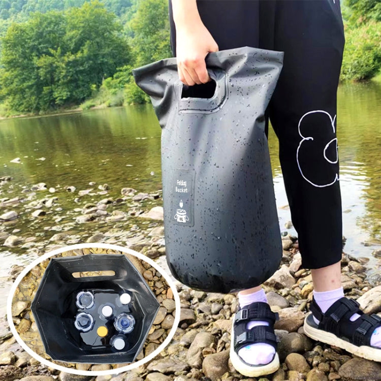 Foldable bucket, dark gray with carry handle and leak-resistant, lined interior.