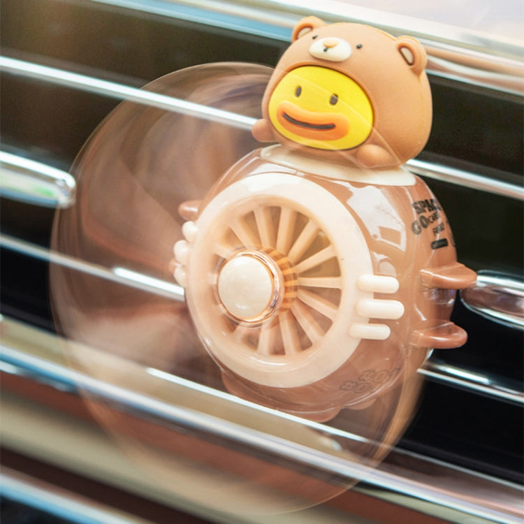 Pilot-shaped car air freshener ornament clipped to a dashboard vent with bear pilot helmet