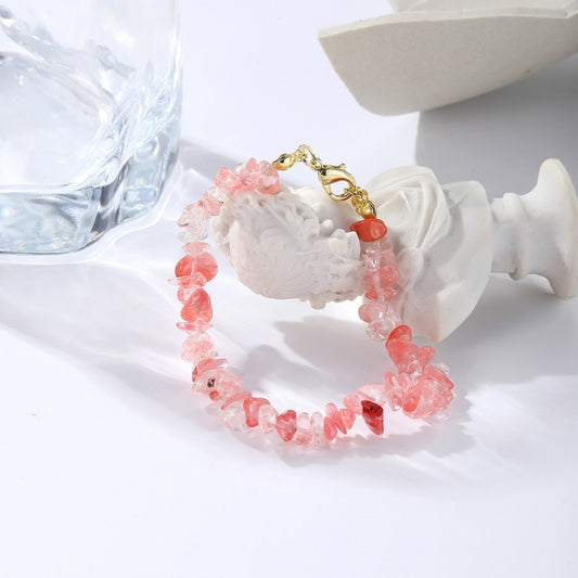 Pink beaded bracelet anklet with gold-tone clasp, faceted translucent stones