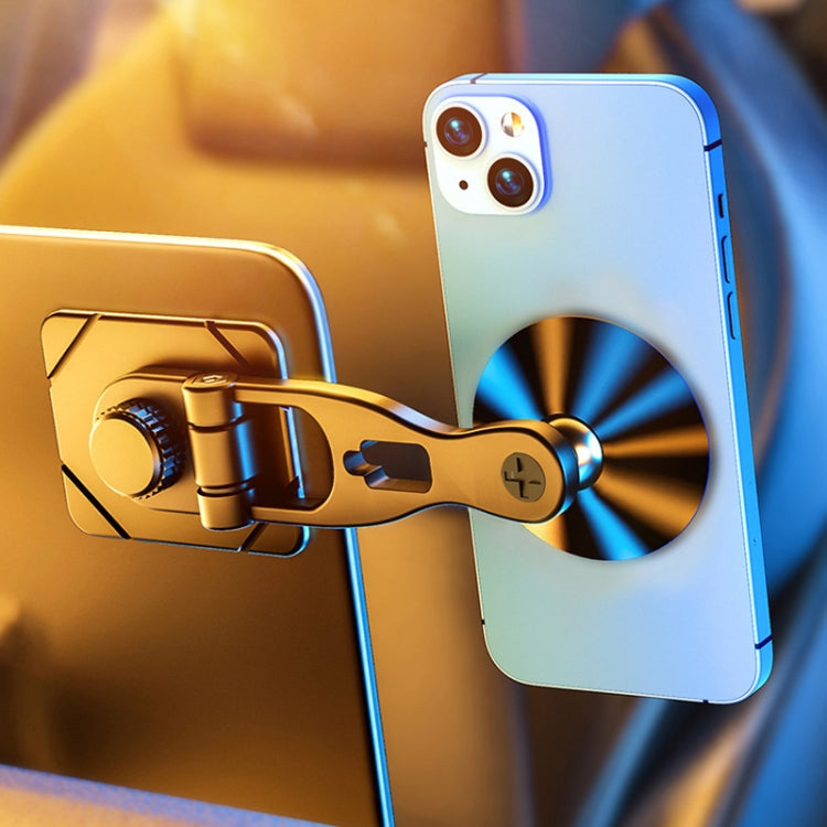 Car magnetic phone holder holding a smartphone with round gold metal mount
