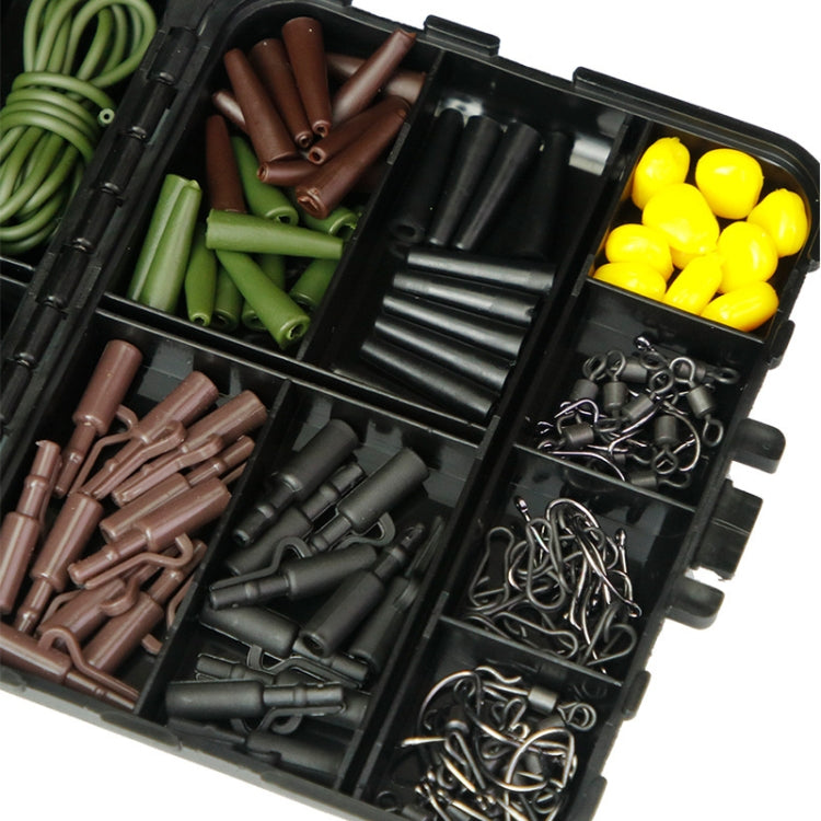 Fishing hook swivel tackle set open case with green and brown pieces, yellow beads, swivels