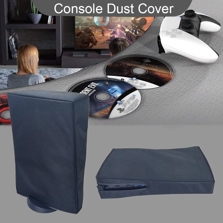 Gray console protective cover shown on a console with controller nearby
