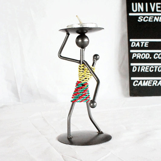 Man-shaped metal candlestick ornament with colorful coiled body and round base