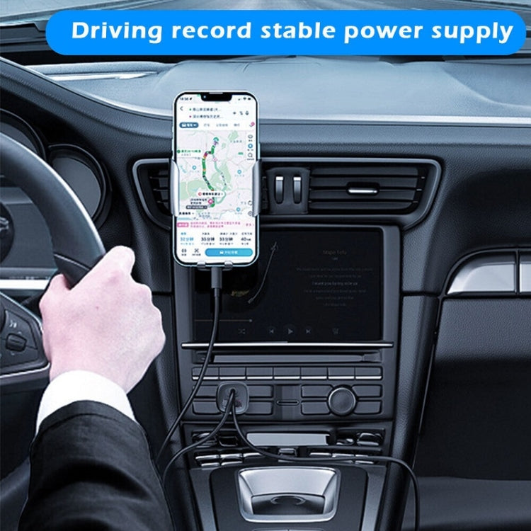 Black dual-port PD USB car charger powering a smartphone in the dashboard