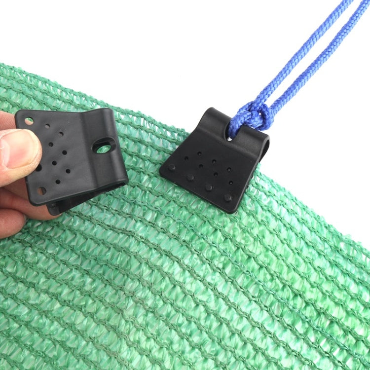 Black butterfly net clip fastening green shade netting with looped rope