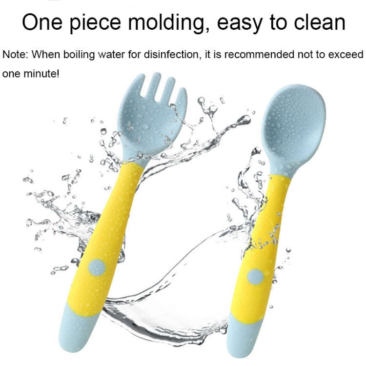 Silicone spoon and fork with water droplets for rinsing, light blue and yellow handles