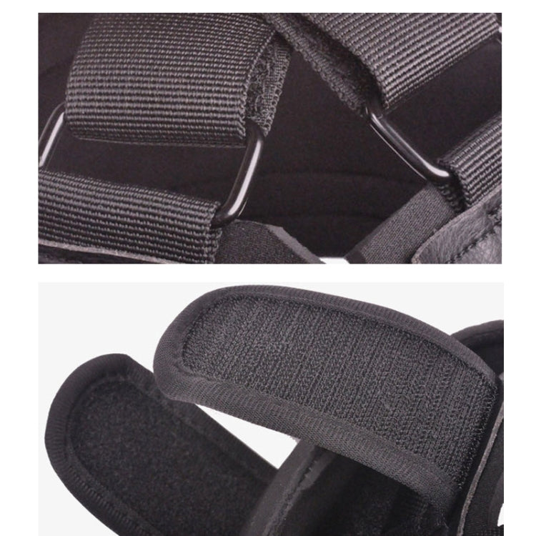 Close-up of black padded strap and textured fabric with metal ring attachment