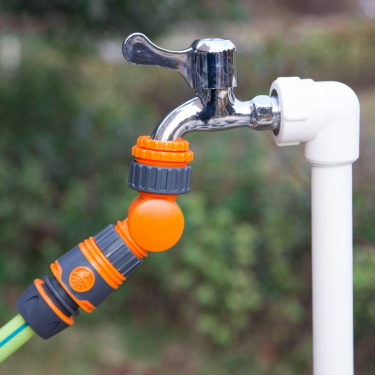 Washing machine faucet connector attached to chrome outdoor tap with orange swivel valve