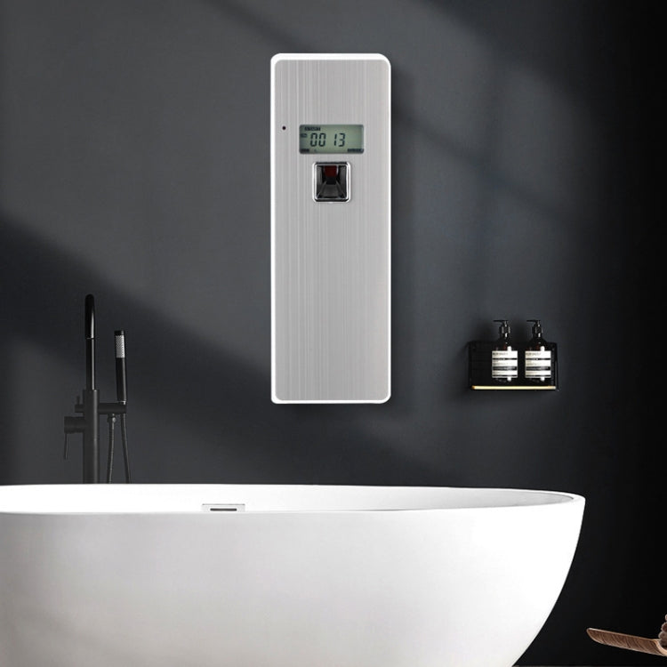 Brushed stainless automatic fragrance sprayer with LCD timer, wall-mounted above sink