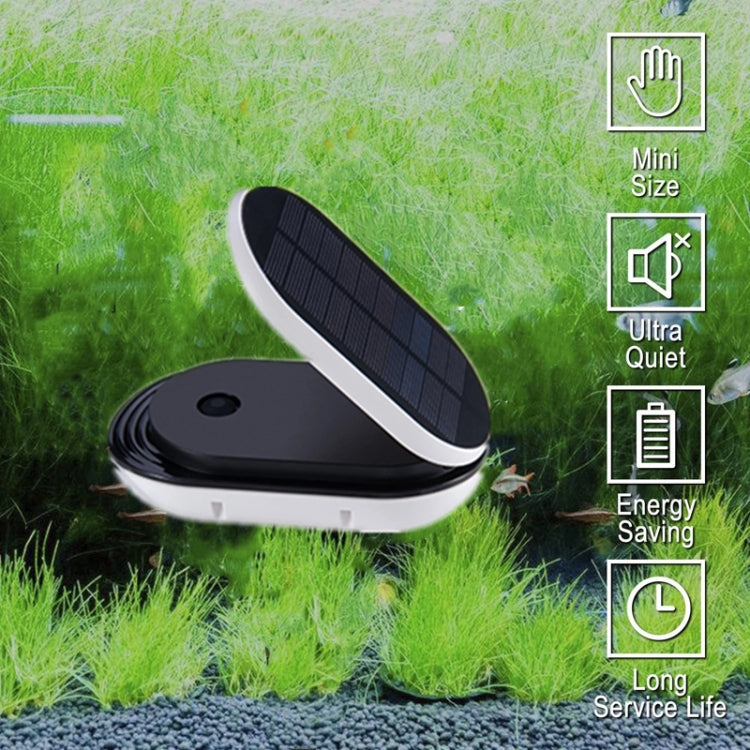 Portable solar air pump on grass with dark panel and white border