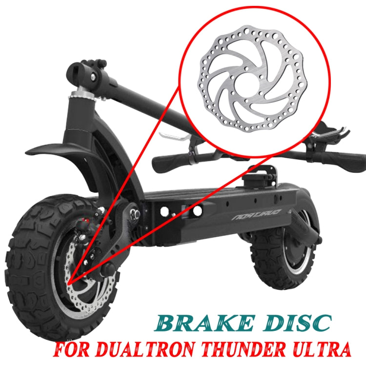 Highlighted six-hole disc brake rotor on electric scooter front wheel area