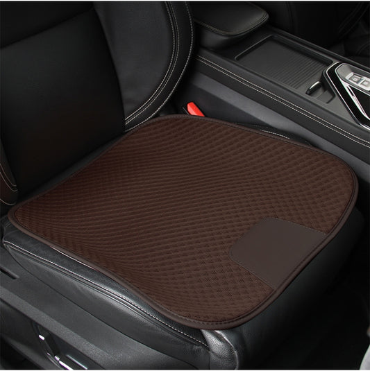 Brown car seat without backrest cushion with textured mesh and corner strap patch