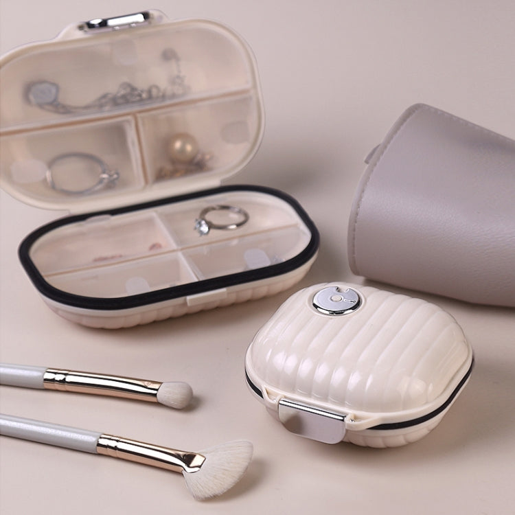 Portable airtight pill dispenser box with ribbed white lid and clasp