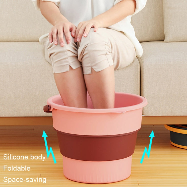 Folding plastic bucket with wide rim, pink collapsible design