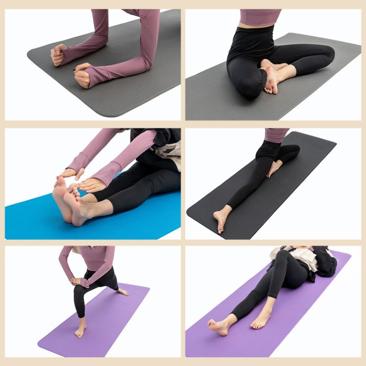 Thick NBR yoga mat with textured non-slip surface, shown in gray and purple.
