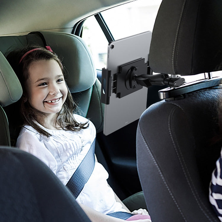 Car headrest tablet holder mounted behind driver seat with tablet attached