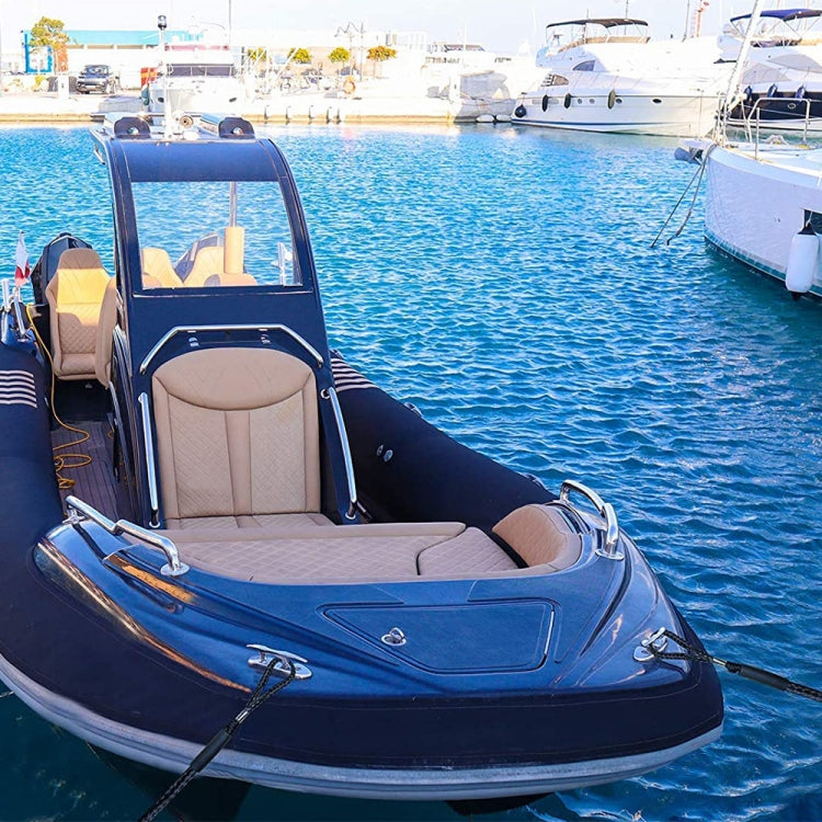 Blue kayak bow with metal cleat and mooring rope secured