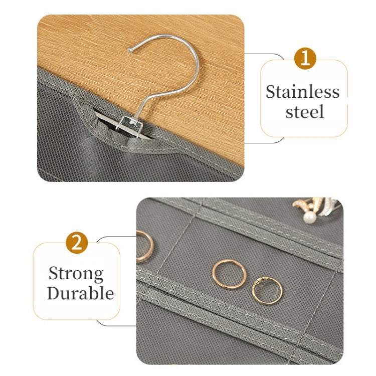 Stainless steel hanging hook with reinforced stitching on a jewelry organizer bag