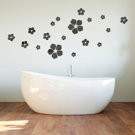 Black cherry blossom mirror wall stickers scattered above a white bathtub.