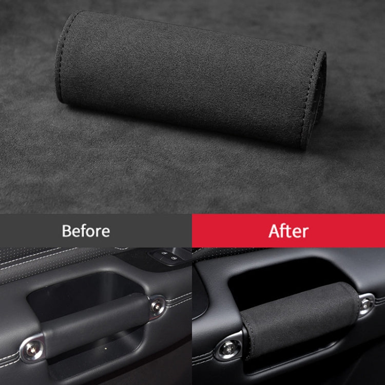 Black padded leather car door handle cover with stitched edge and circular fastener