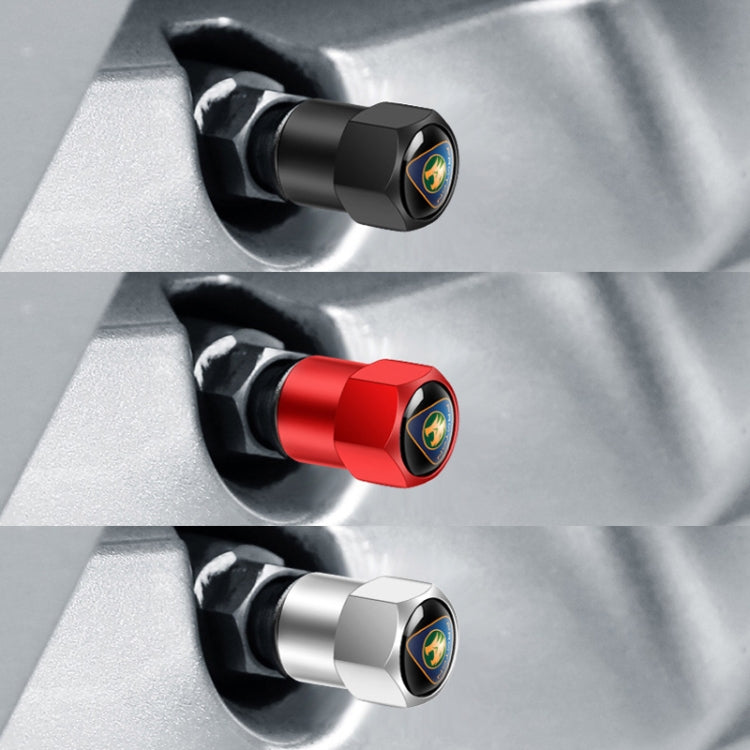 Car tire valve caps set in black, red, and silver with labeled emblem