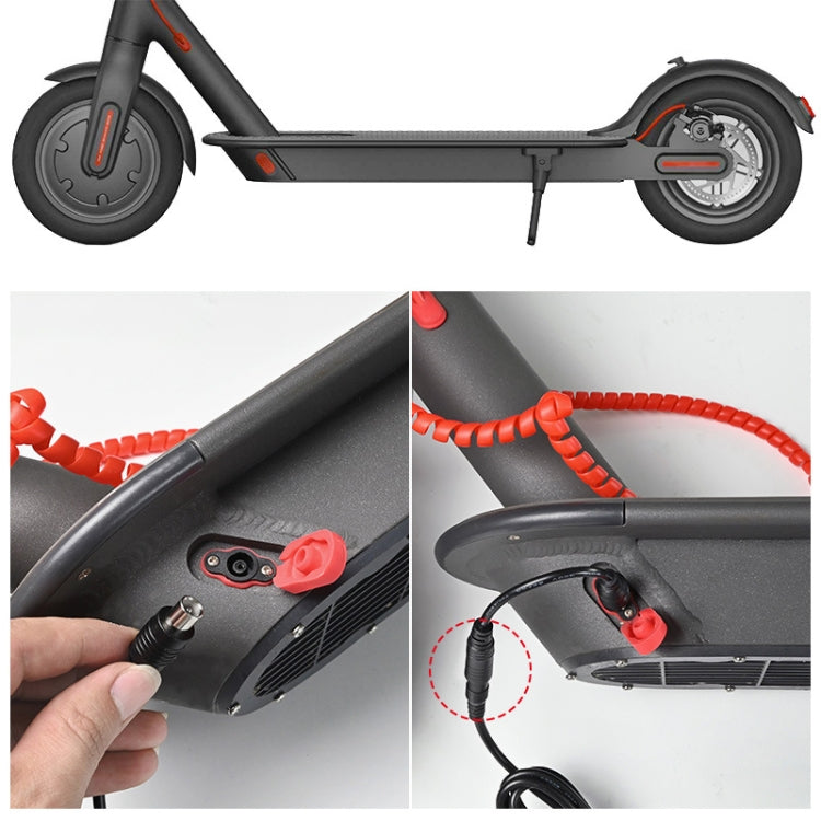 Hand holding charger plug near scooter charging port with visible red charging cable
