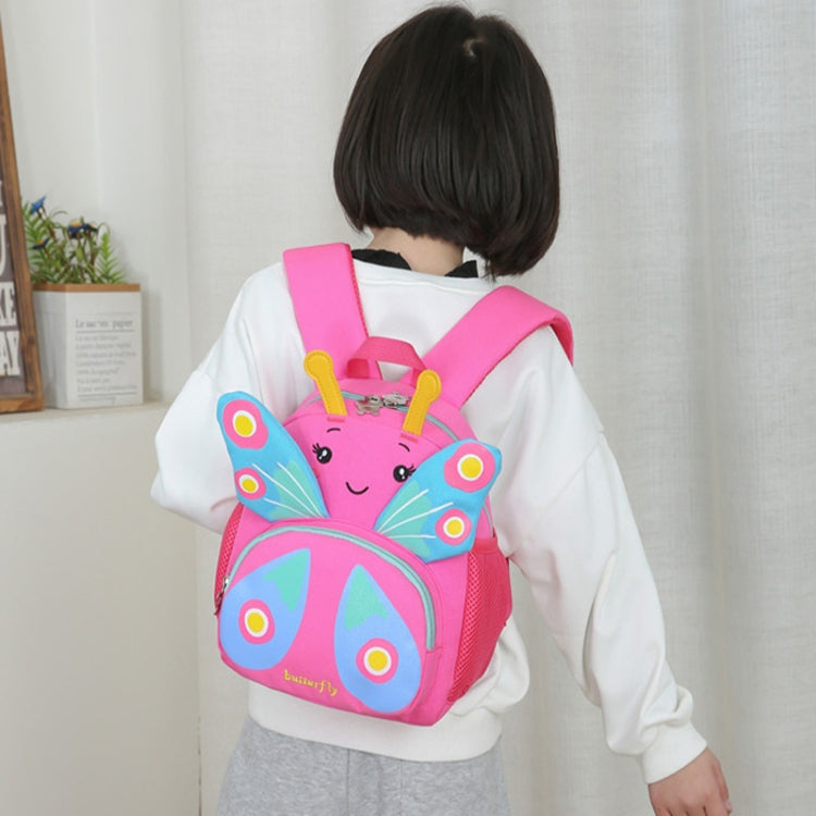Child wearing pink butterfly kids backpack, back view with colorful wing design