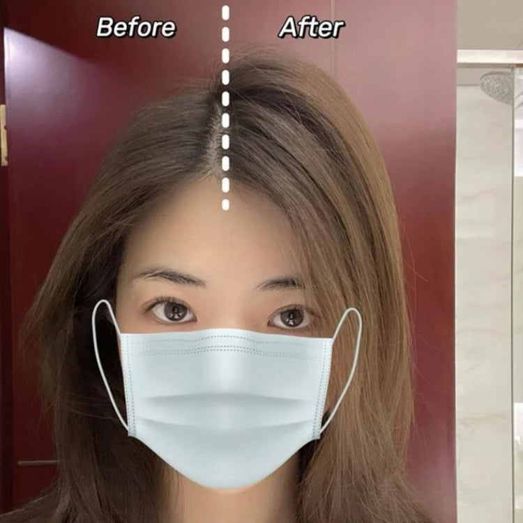 Hair parted with a dotted guide line on a model wearing a face mask