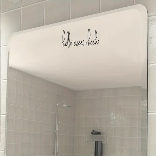 Vinyl mirror decorative sticker, black cursive “hello sweet cheeks” on a rectangular mirror