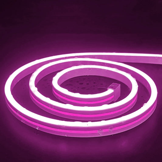 Pink glowing flexible LED neon light strip in a coil with USB connector.