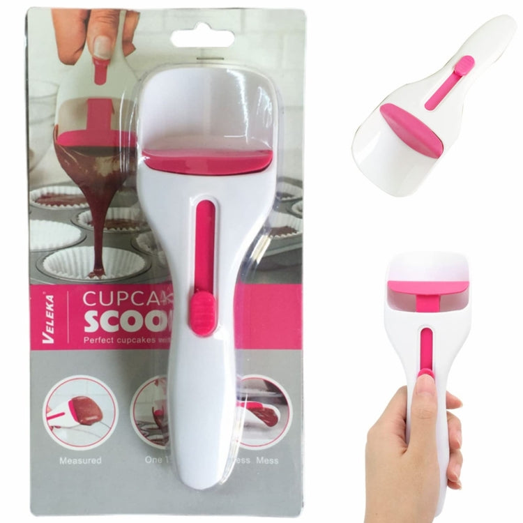 Cupcake scoop spoon in retail package, white handle with pink silicone scoop