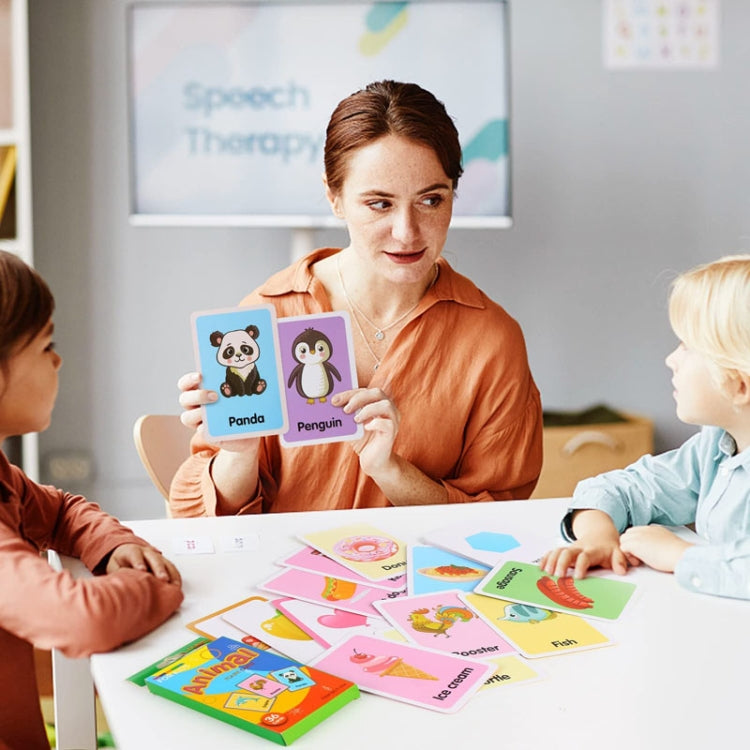 Children's word learning flashcards, animal picture cards held up for matching
