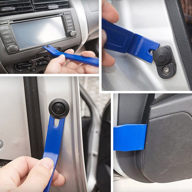 Blue plastic trim tool with metal tip for door and dashboard panel removal