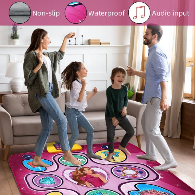 Pink electronic dancing mat with icon tiles; kids stand on the game pad