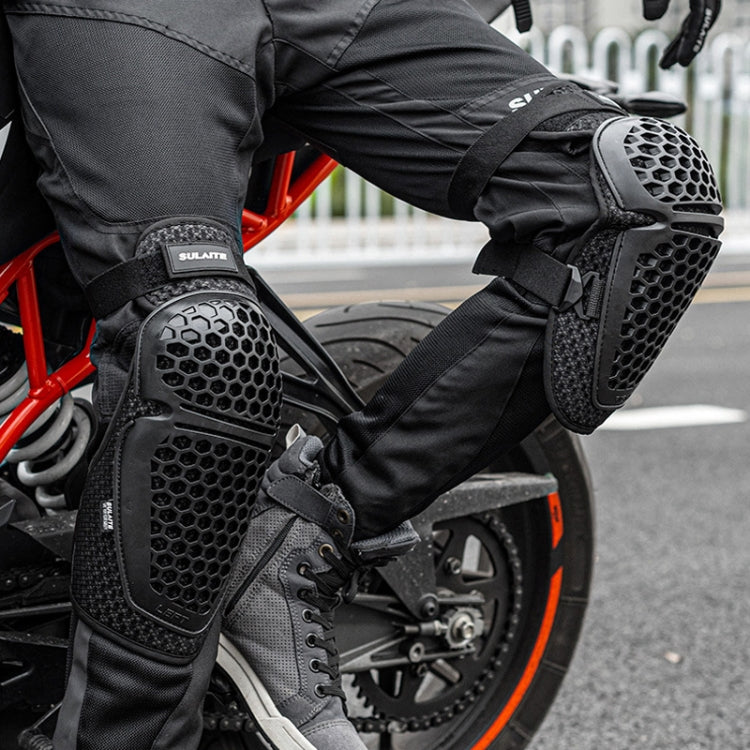Black knee and elbow pads with hex honeycomb protection for riding