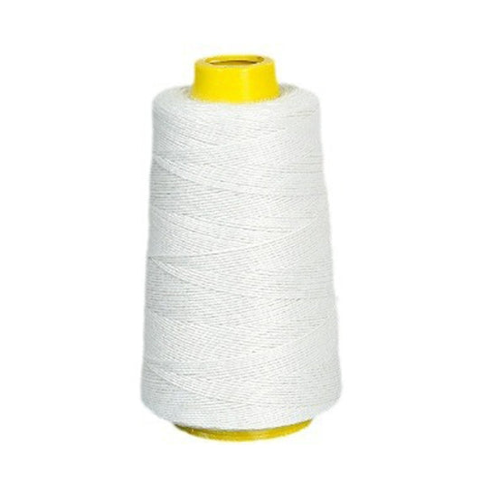 White sewing thread spool with yellow plastic core