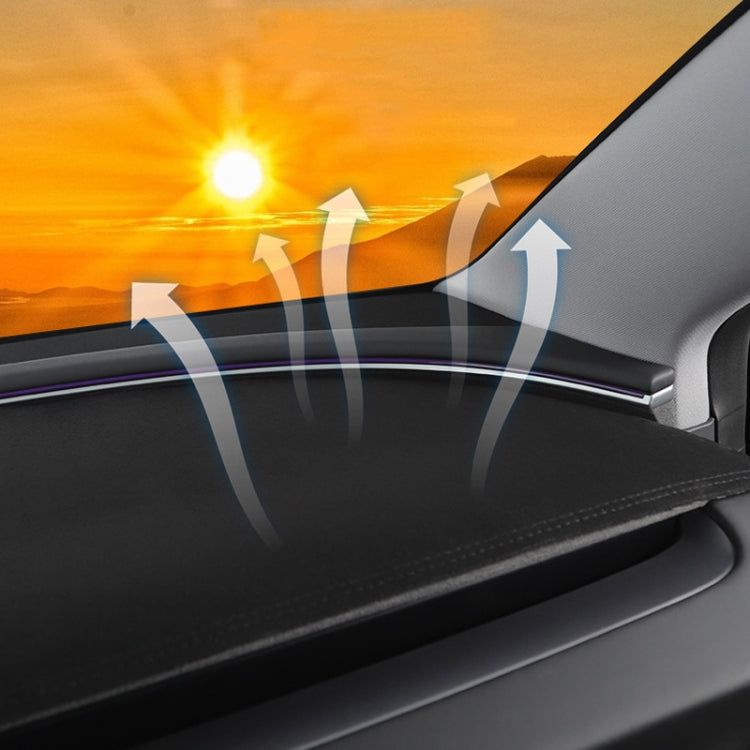 Dark suede light-blocking dashboard pad showing stitched seam and covered surface