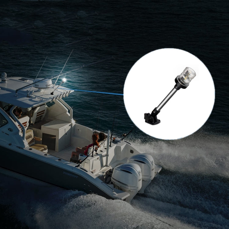 LED yacht anchor light mounted on a boat deck with clear lens on black pole