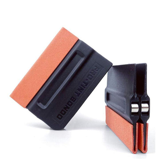 Car film scraper tool with orange abrasive pads and black magnetic base
