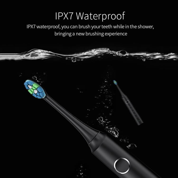Black sonic electric toothbrush with blue brush head and round power button