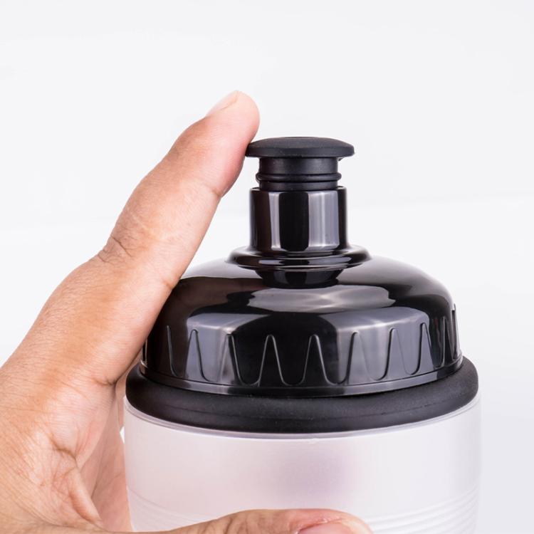 White sports bottle with black flip-top cap, handheld open spout