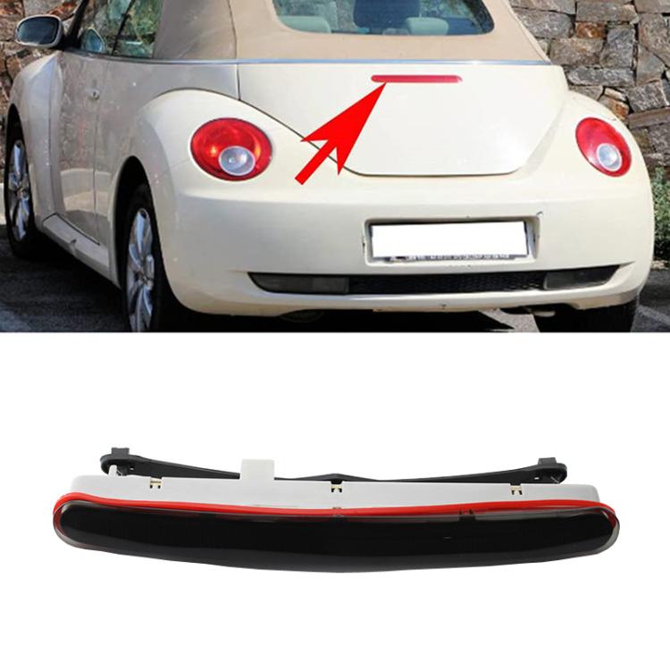 High mounted third brake light installed on car rear, red lens visible