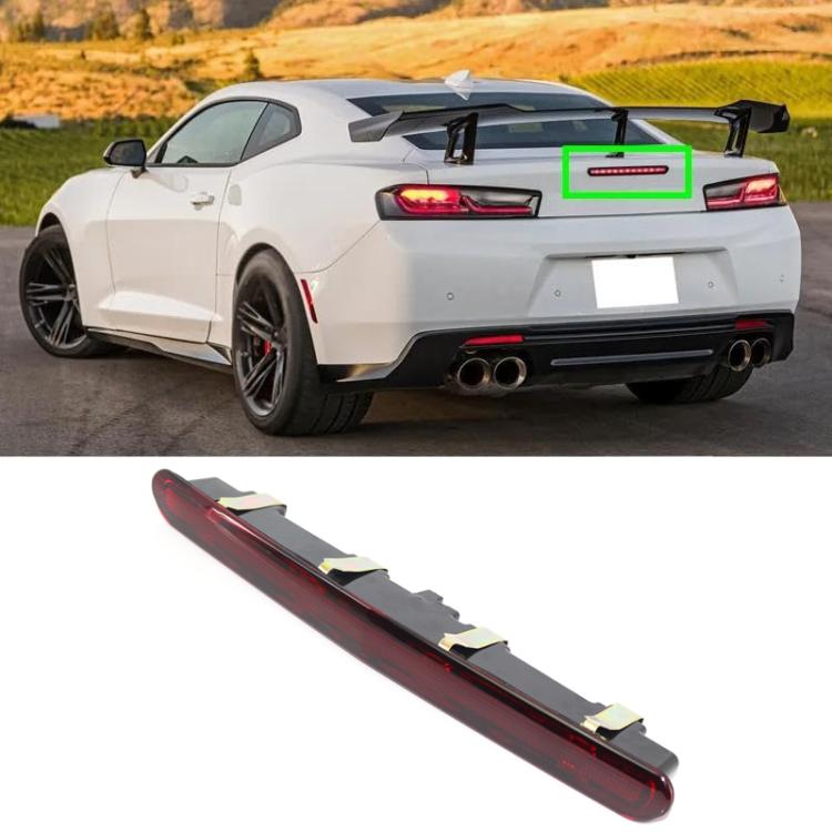 High-mount brake light on rear spoiler, red lens bar with black housing