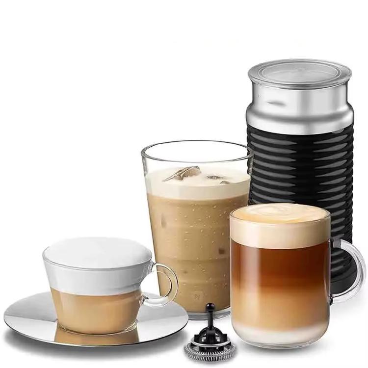 Milk frother whisk attachment shown with froth cups and frother unit