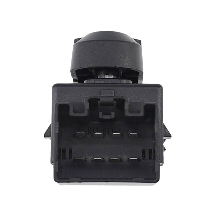 Black seat adjustment switch viewed from rear, showing internal connector terminals